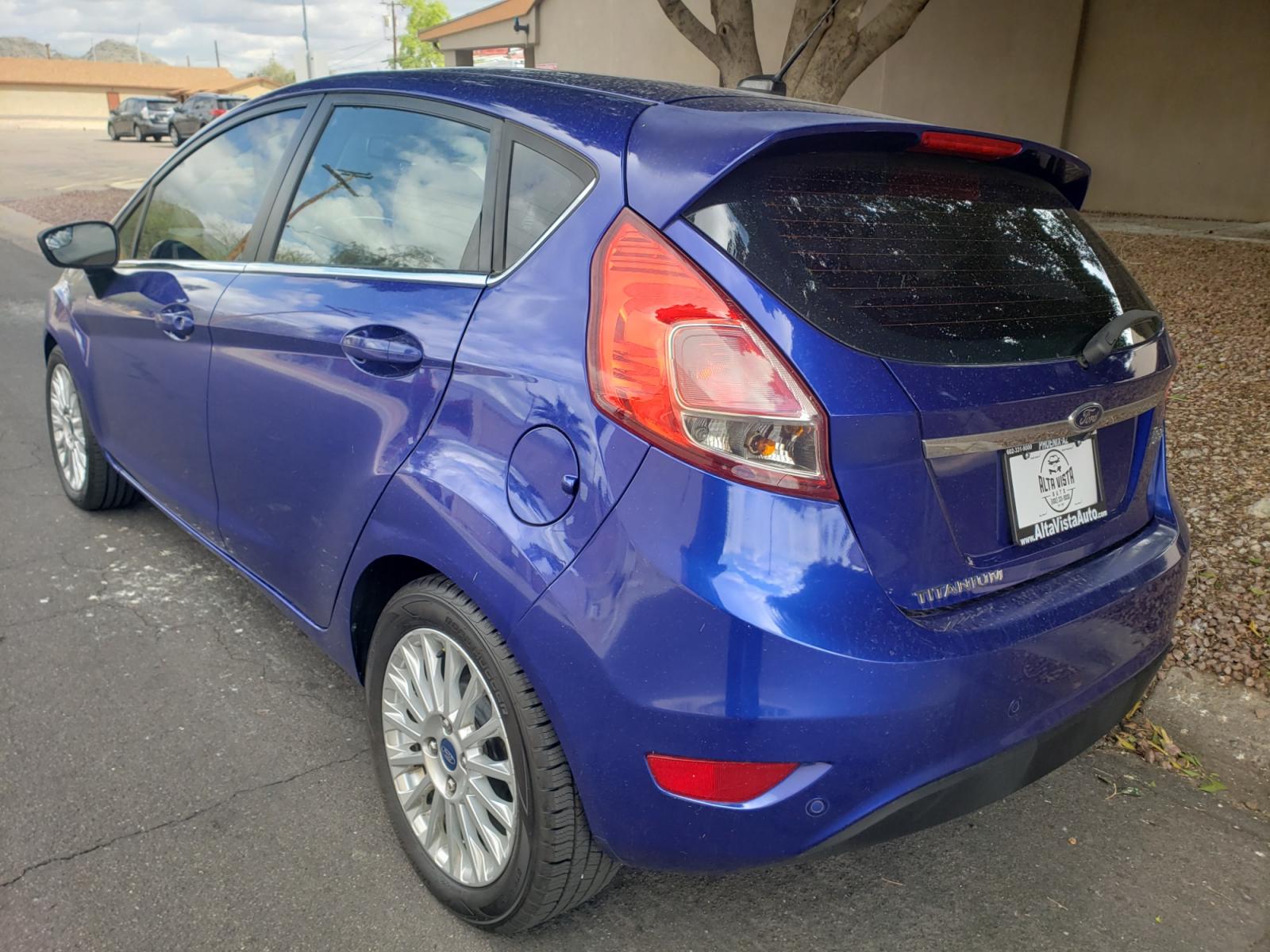 2014 /Tan and black Ford Fiesta Titanium (3FADP4FJ5EM) with an 1.6l i4 engine, 6-Speed Automatic transmission, located at 323 E Dunlap Ave., Phoenix, AZ, 85020, (602) 331-9000, 33.567677, -112.069000 - 2014 Ford Fiesta Titanium,.......A Must See!!... No accidents, Only 95K MILES.... Ice cold AC. The car is gorgeous inside and out. Power windows, Power door locks, Touch screen Stereo/ CD Player, Phone sync, Bluetooth, Satellite compatible, Backup camera, Beautiful tan and black interior with tan le - Photo #5